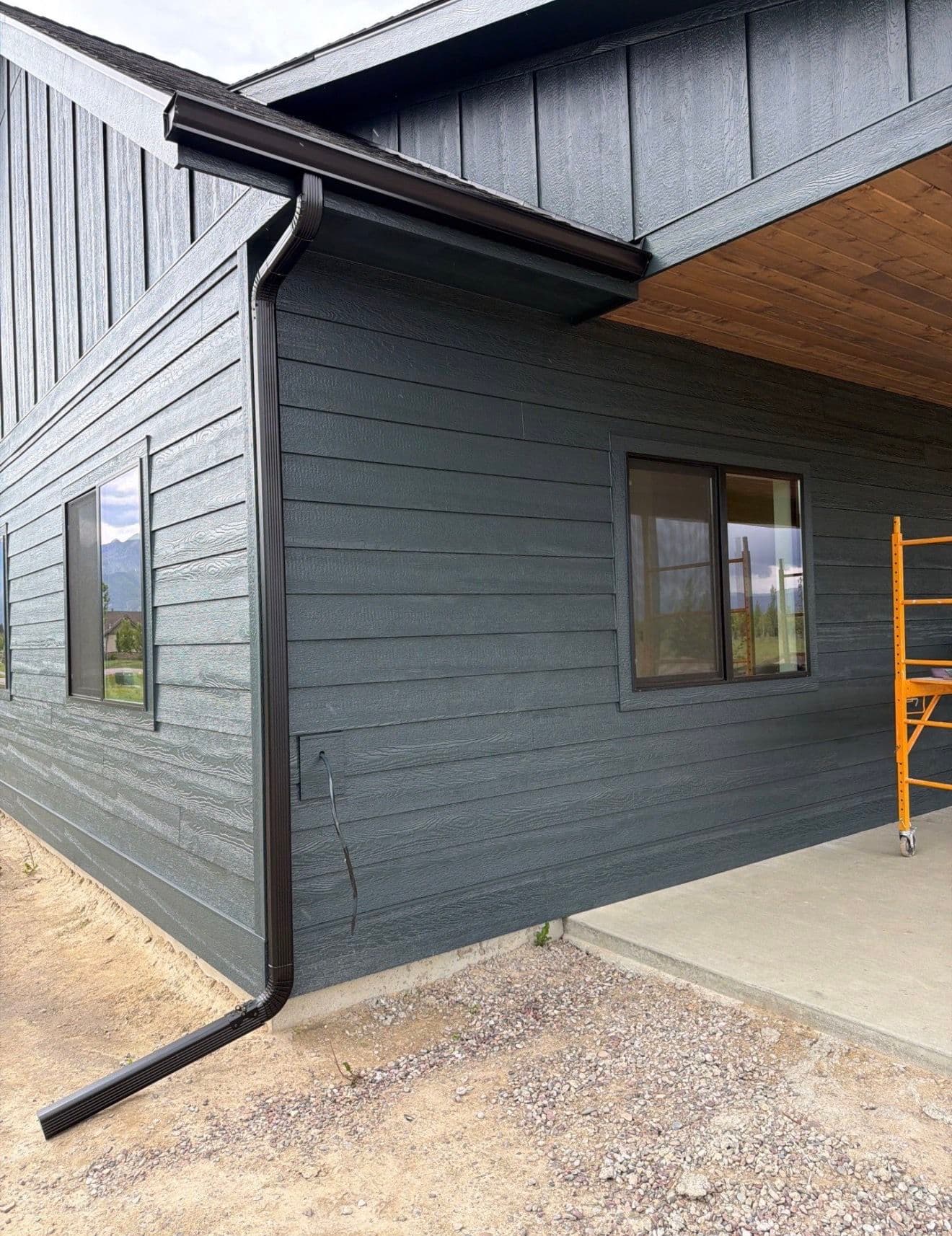 Gallery photos for Black Gutter Installation with Oversized Downspouts on New Construction: Image #3