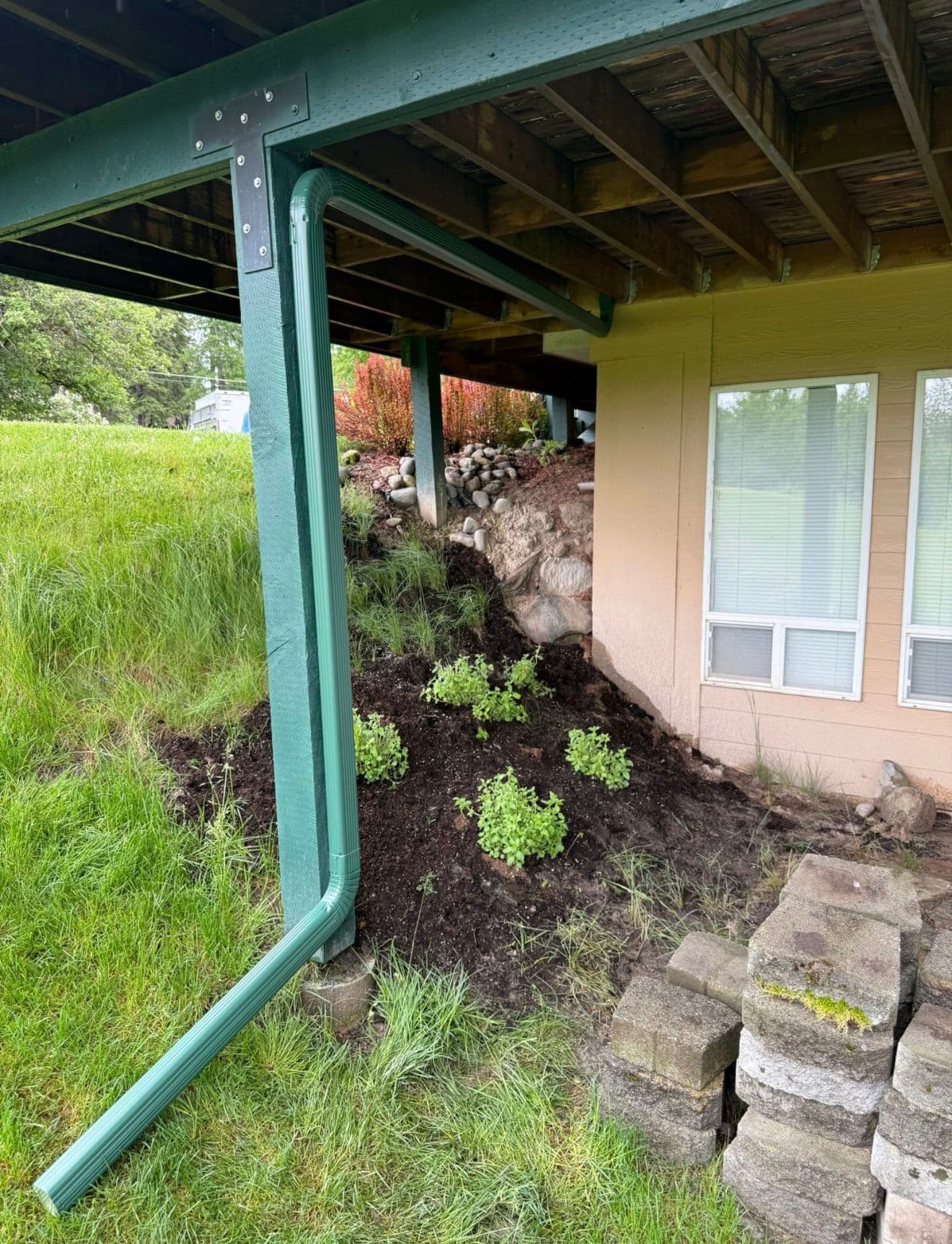 Gallery photos for Evergreen Gutter Installation Keeps Lynda's Deck and Foundation Dry: Image #2