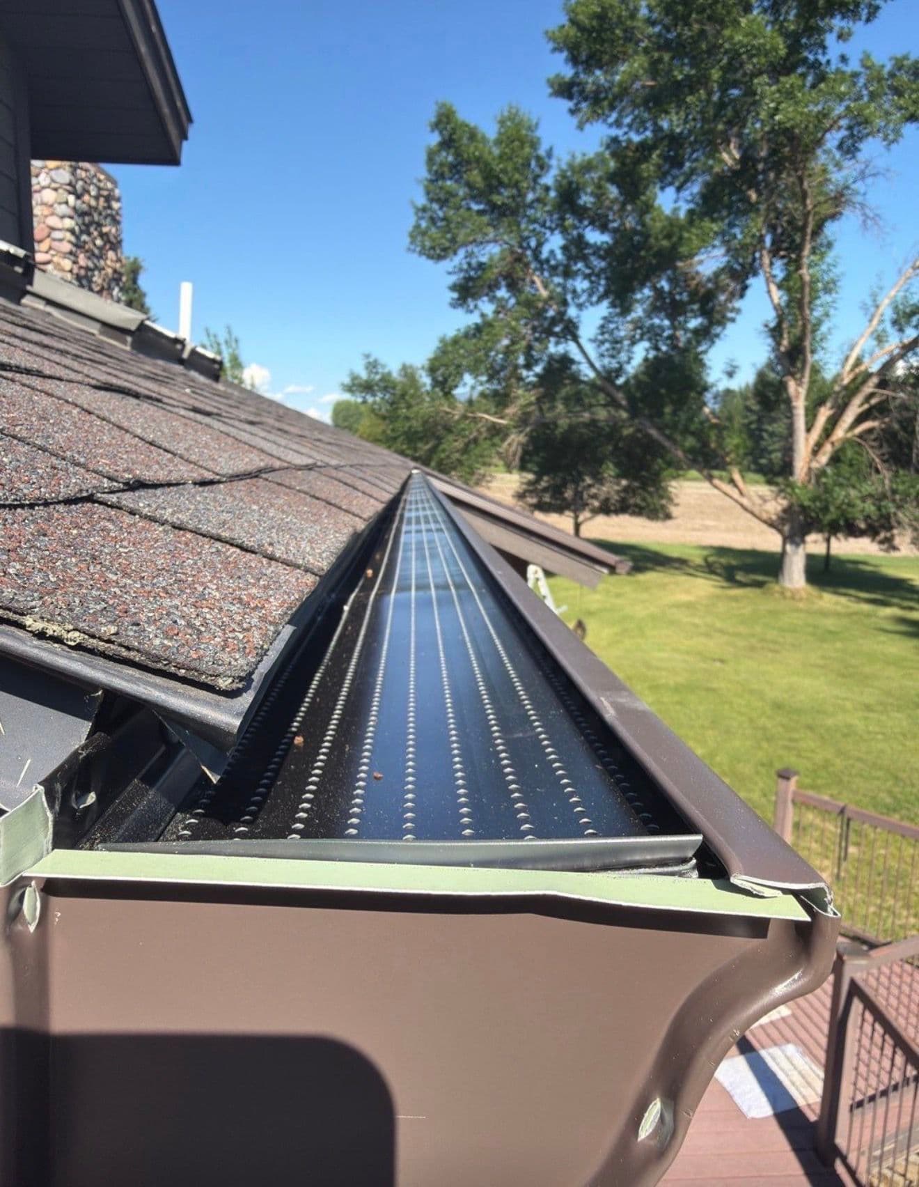 Seamless Gutters and Leaf Guard Protection on a Large Property image