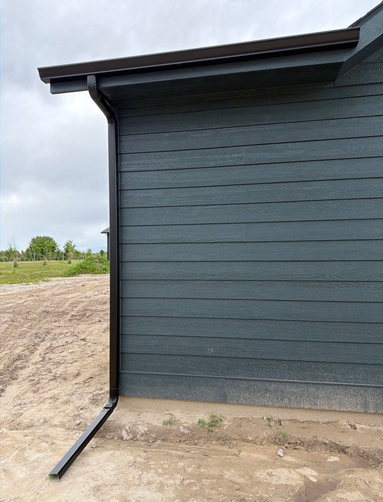 Gallery photos for Black Gutter Installation with Oversized Downspouts on New Construction: Image #5