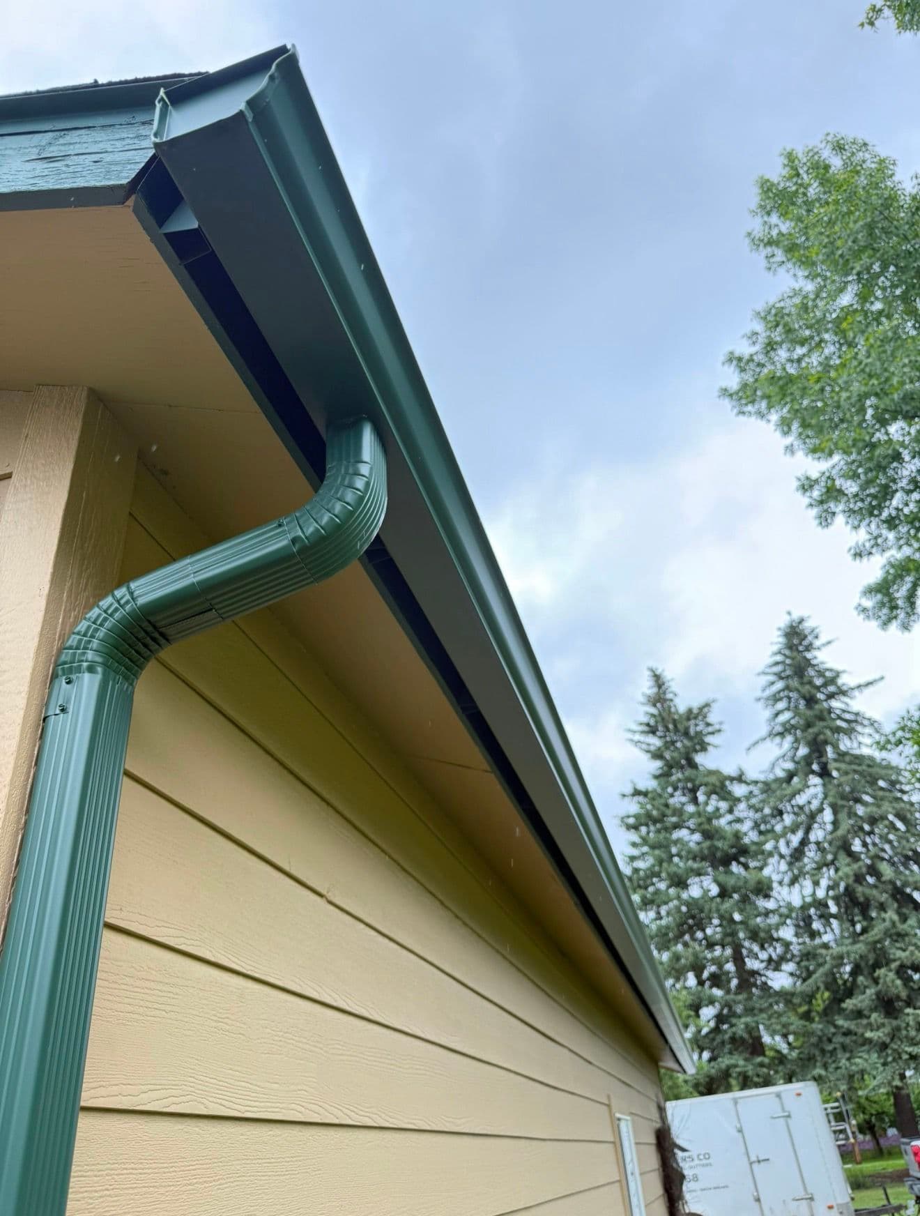 Gallery photos for Evergreen Gutter Installation Keeps Lynda's Deck and Foundation Dry: Image #3