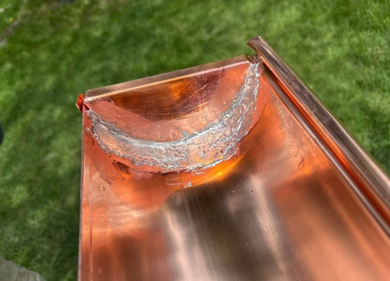 Seamless Copper Half-Round Gutter Installation in Bigfork MT
