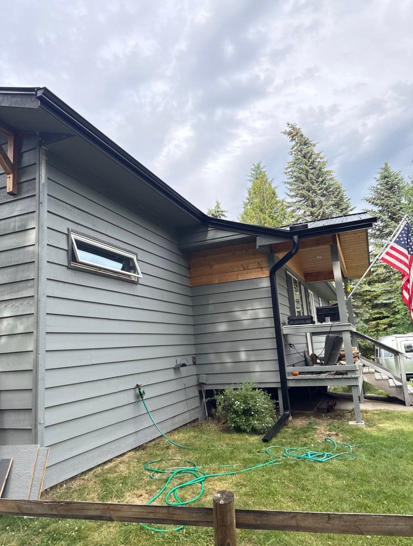 Full Black Gutter Installation with Oversized Downspouts and Custom Fascia Work image