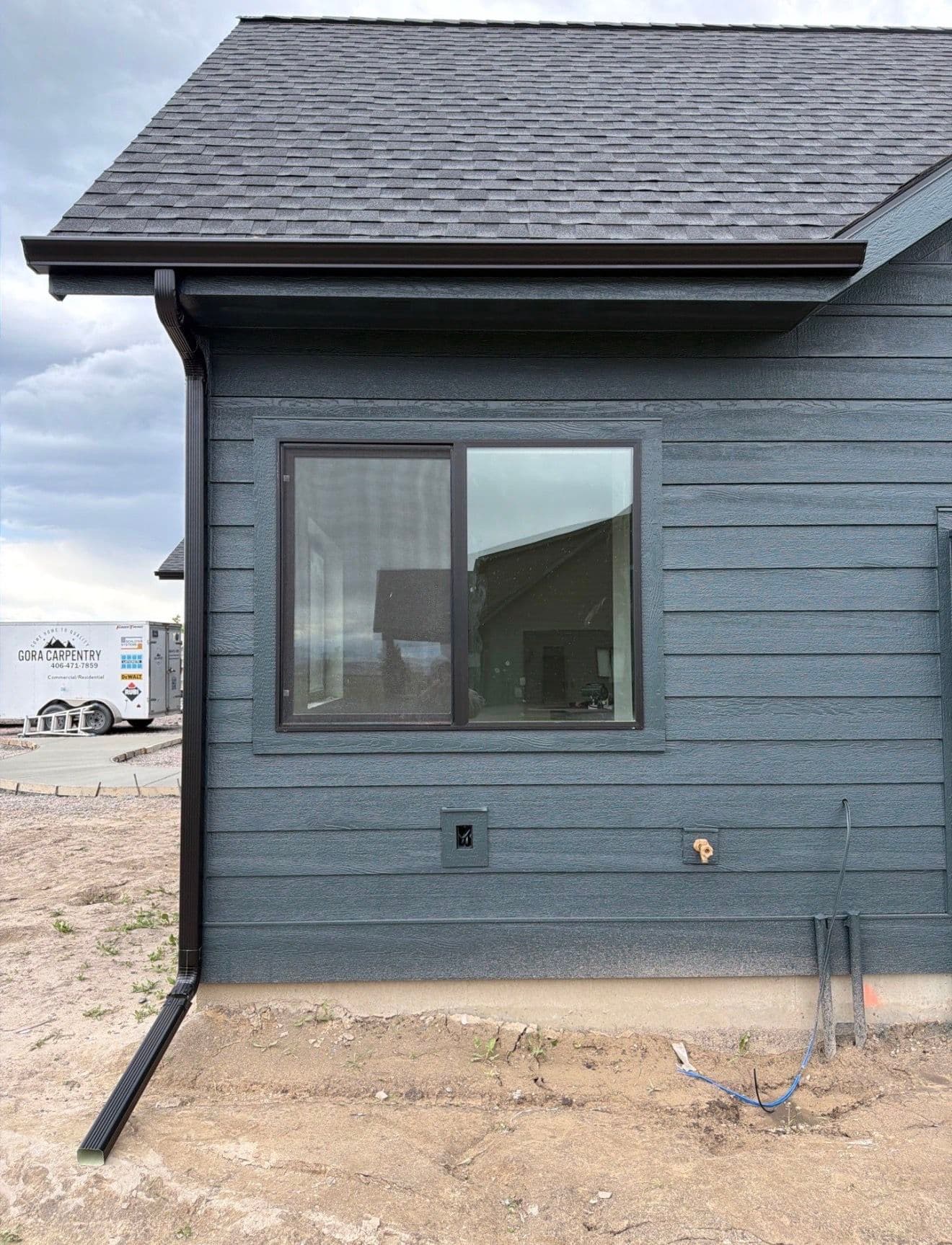 Gallery photos for Black Gutter Installation with Oversized Downspouts on New Construction: Image #2