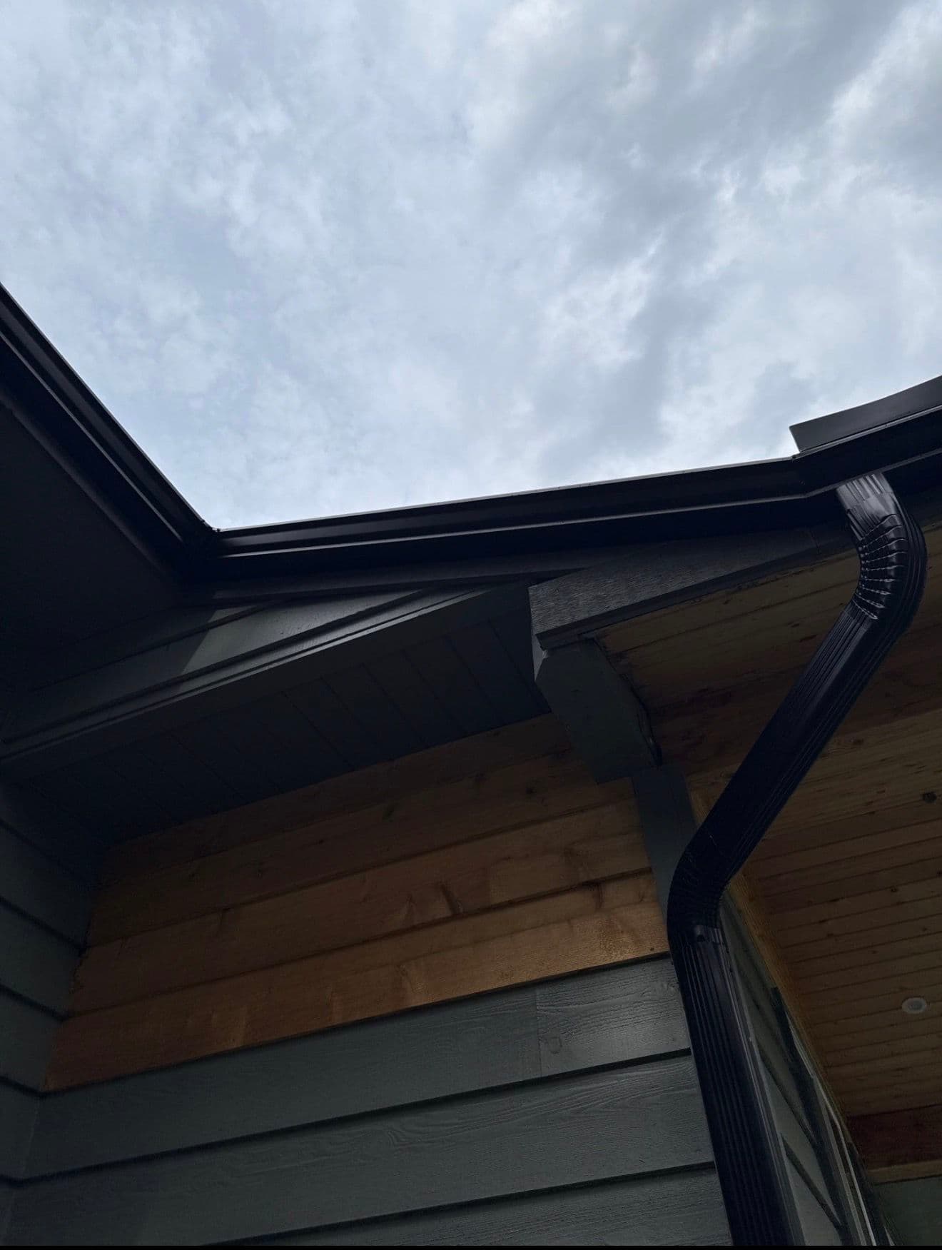 Gallery photos for Full Black Gutter Installation with Oversized Downspouts and Custom Fascia Work: Image #1