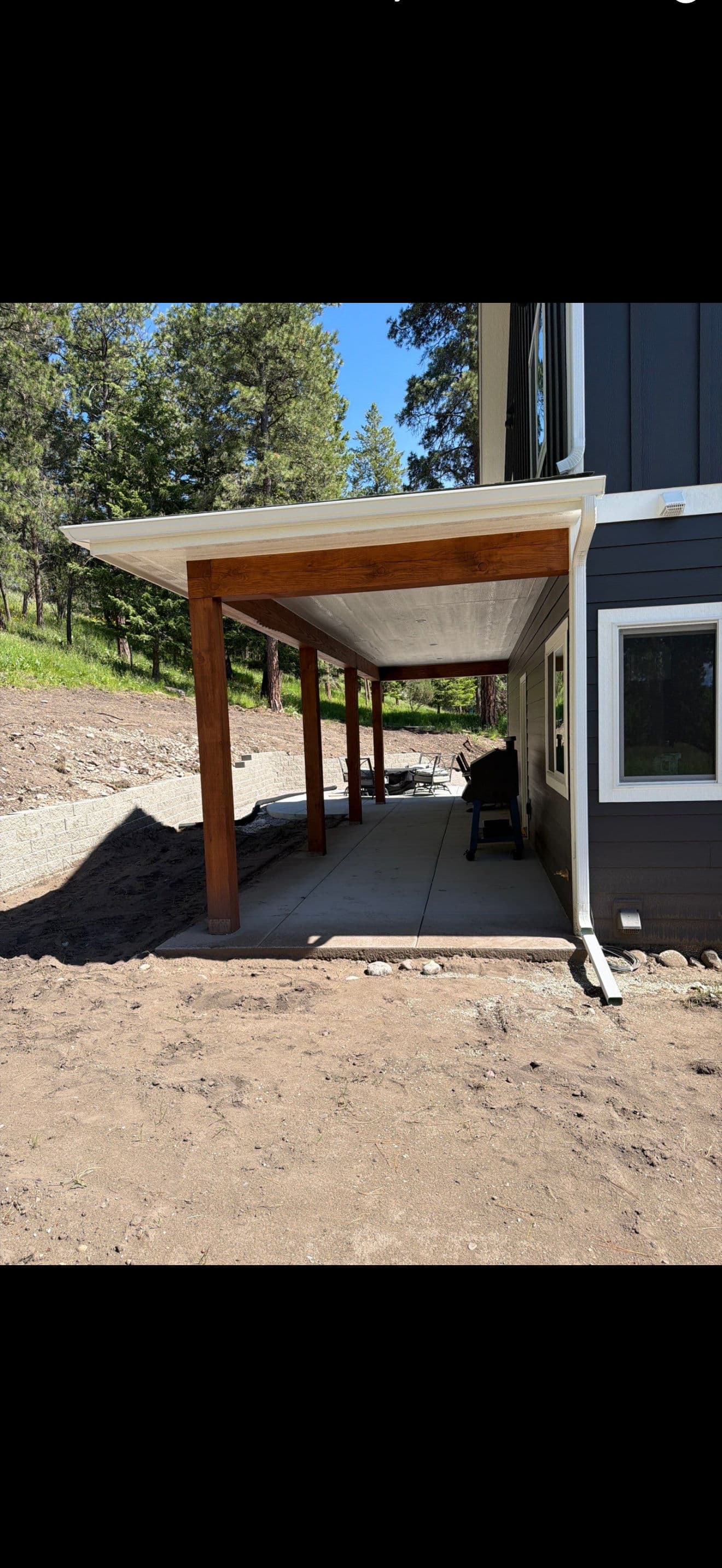 Gallery photos for Seamless White Gutter Installation on a Two-Story Modern Home: Image #4