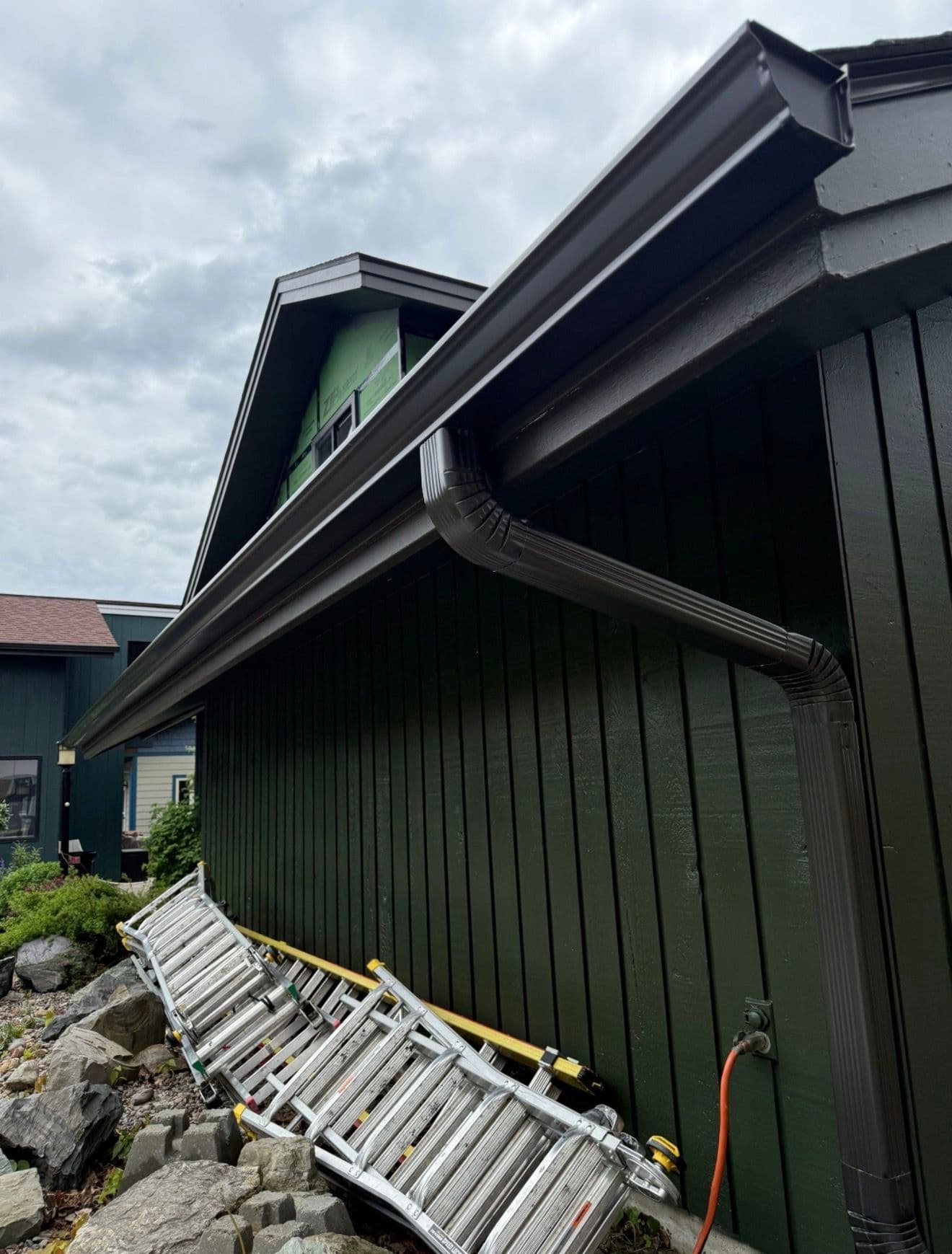 Weathered Bronze Gutter Installation That Actually Makes a House Pop image