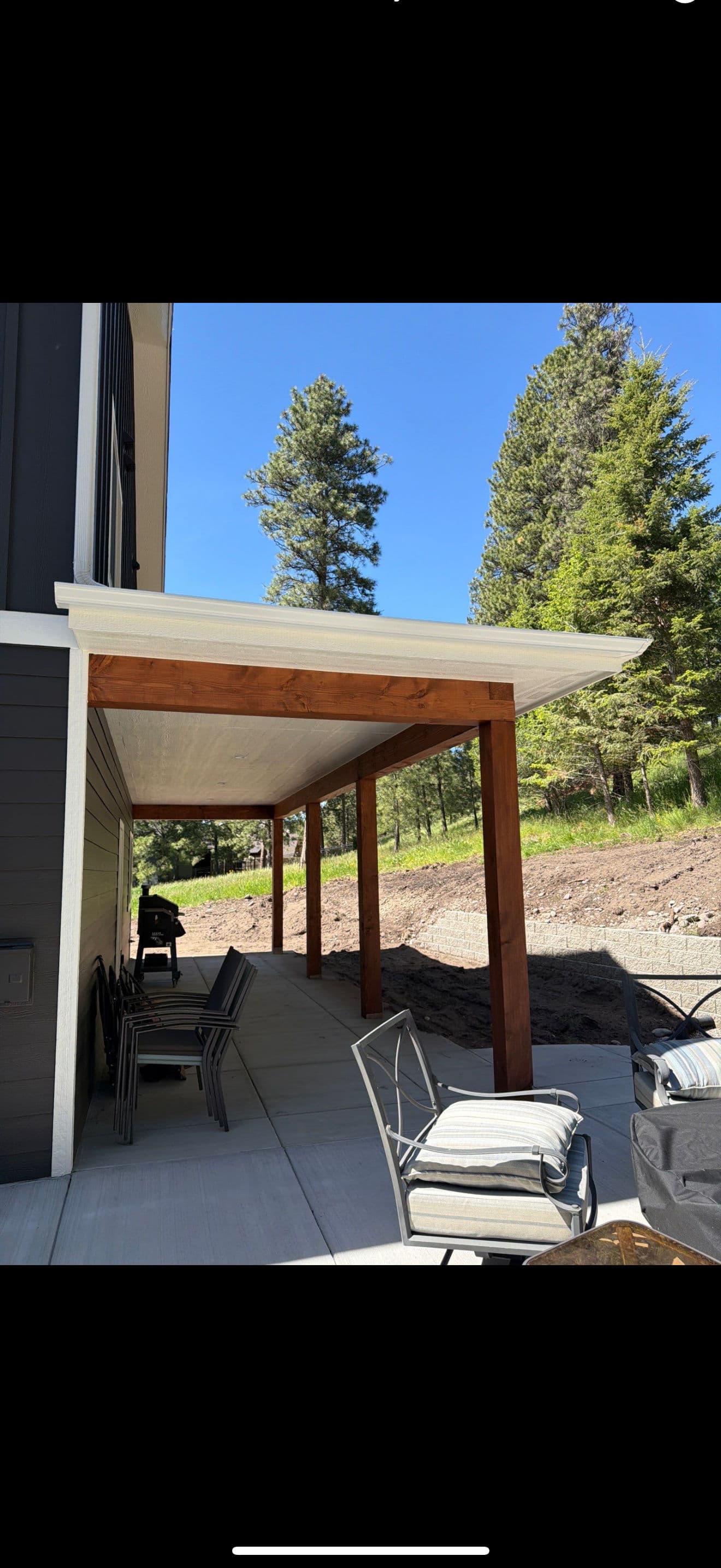 Gallery photos for Seamless White Gutter Installation on a Two-Story Modern Home: Image #6