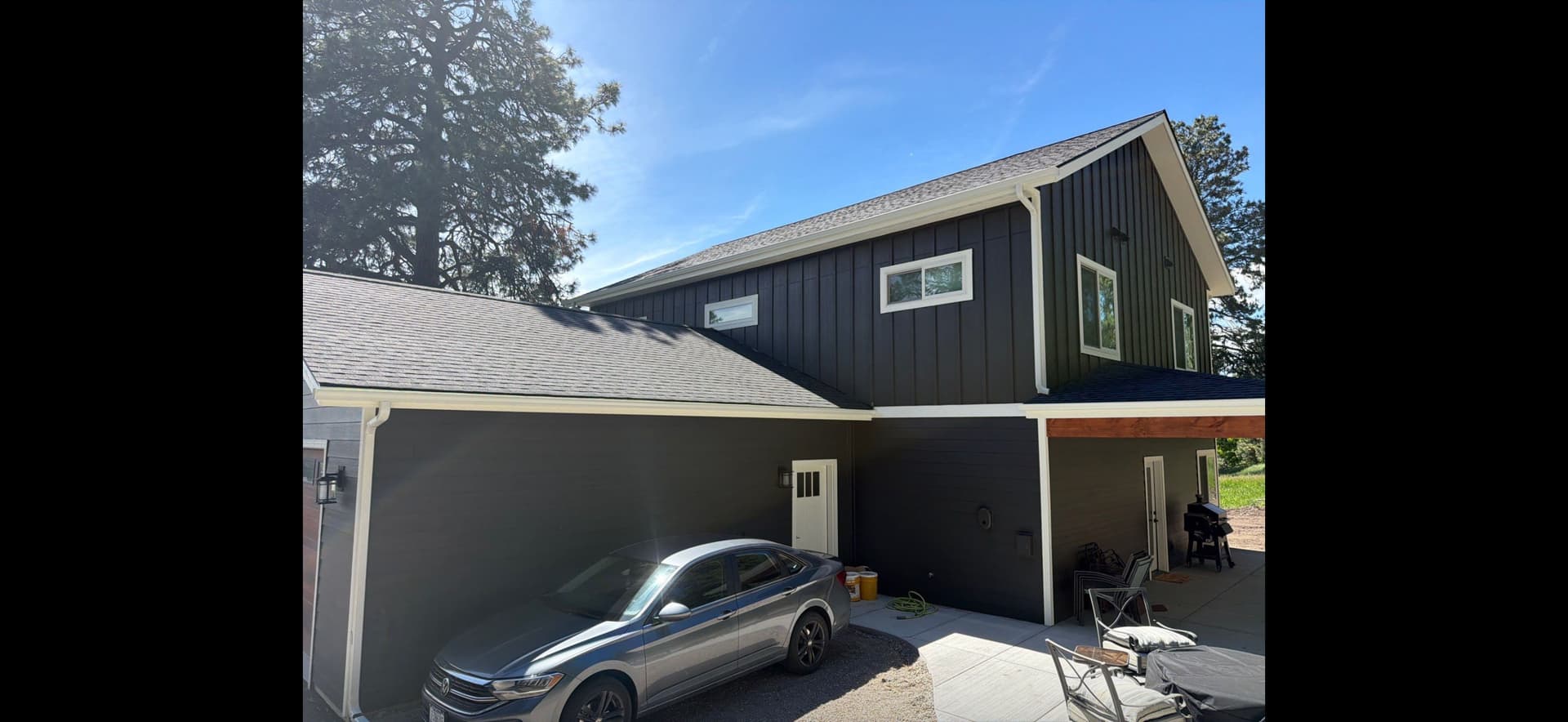 Gallery photos for Seamless White Gutter Installation on a Two-Story Modern Home: Image #8