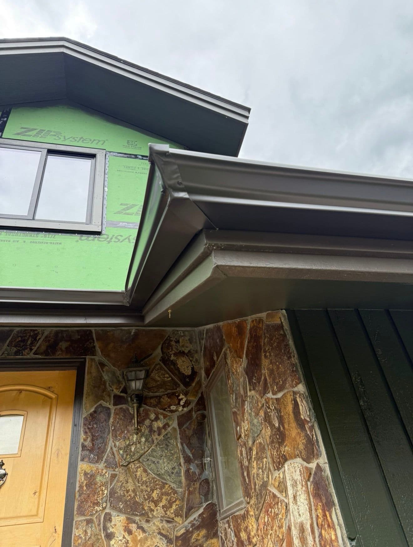 Gallery photos for Weathered Bronze Gutter Installation That Actually Makes a House Pop: Image #1
